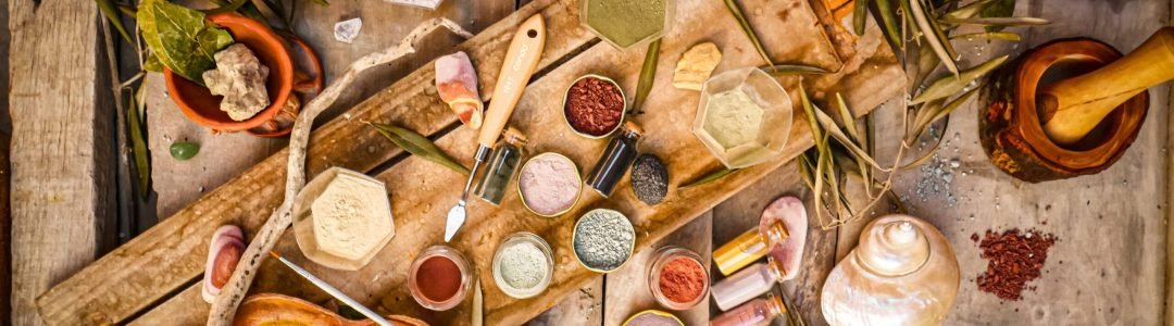 An artistic display of spices and ingredients on a rustic wooden tray, capturing the essence of traditional cooking.